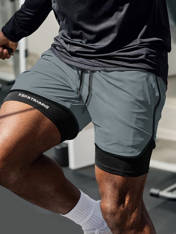 Fake two-piece double-layer sports shorts men's professional fitness running track and field American basketball training three-point pants to prevent exposure