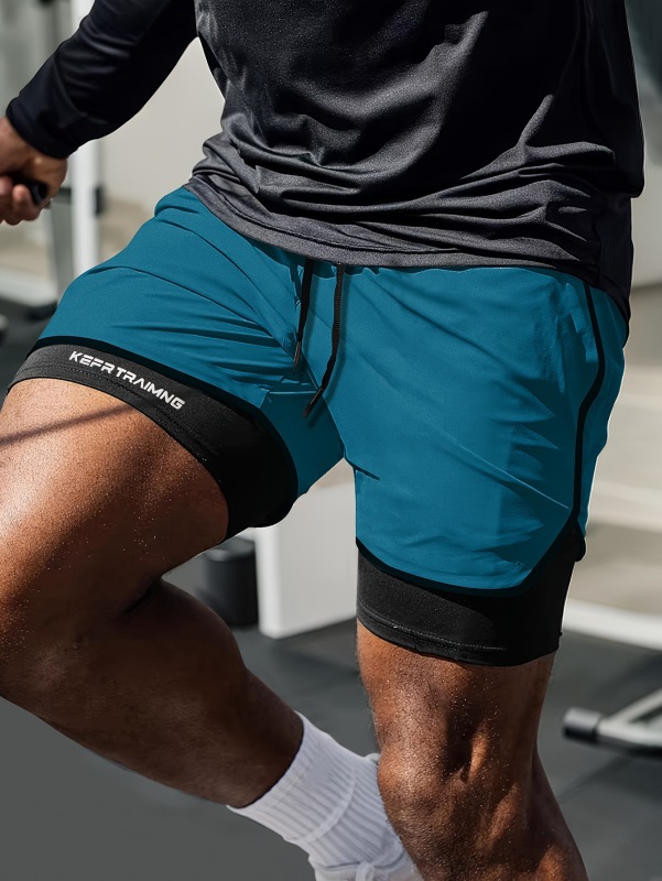 Fake two-piece double-layer sports shorts men's professional fitness running track and field American basketball training three-point pants to prevent exposure