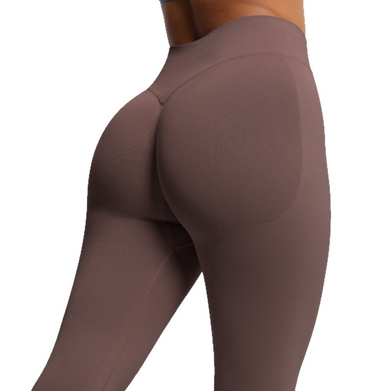 Cross-border European and American peach seamless solid color three-section waist lifting high-waisted yoga pants for women, sports running fitness yoga pants