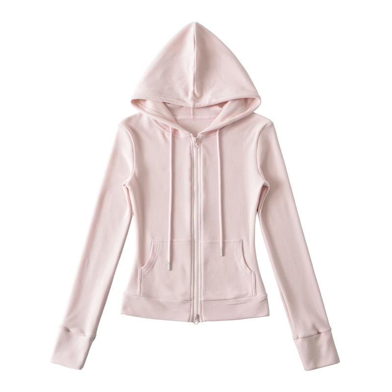 Relaxed fit red tracksuit with long-sleeved hooded zip-up jacket and loose drawstring wide-leg pants.