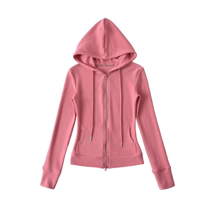 Relaxed fit red tracksuit with long-sleeved hooded zip-up jacket and loose drawstring wide-leg pants.