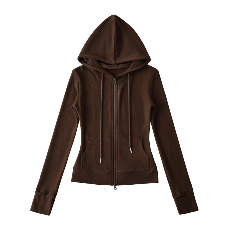Relaxed fit red tracksuit with long-sleeved hooded zip-up jacket and loose drawstring wide-leg pants.