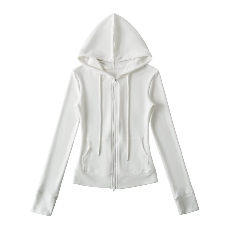 Relaxed fit red tracksuit with long-sleeved hooded zip-up jacket and loose drawstring wide-leg pants.