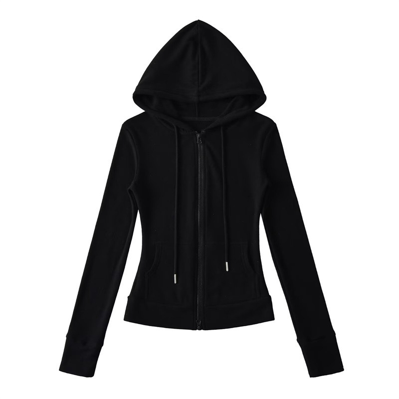 Relaxed fit red tracksuit with long-sleeved hooded zip-up jacket and loose drawstring wide-leg pants.