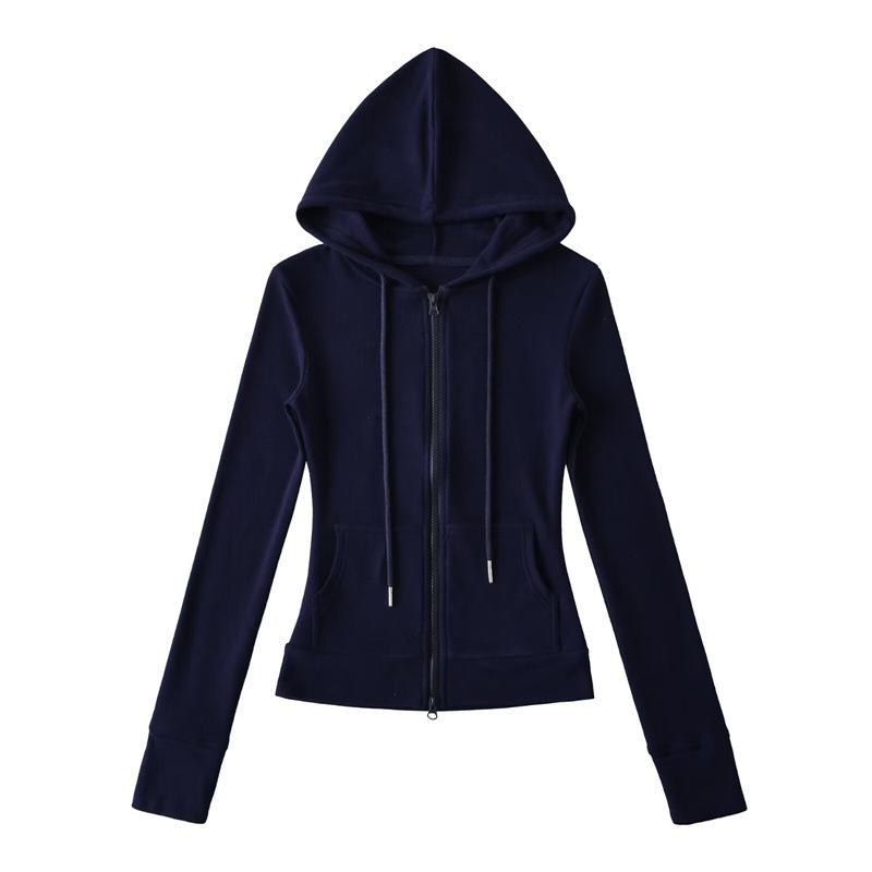 Relaxed fit red tracksuit with long-sleeved hooded zip-up jacket and loose drawstring wide-leg pants.