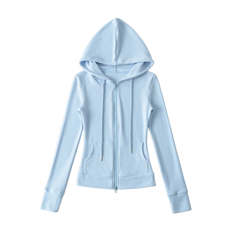Relaxed fit red tracksuit with long-sleeved hooded zip-up jacket and loose drawstring wide-leg pants.