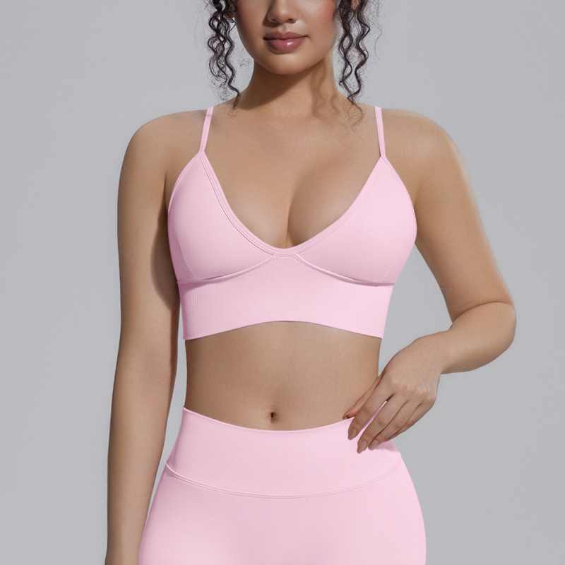 Cross-border European and American seamless knit solid color tight-fitting backless sports bra for women, suitable for running, fitness, and yoga.