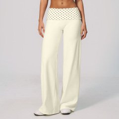 Milky white with black polka dots