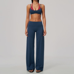 2585 bra + 2585-1 wide-leg pants — a striking clash of light blue and red.
