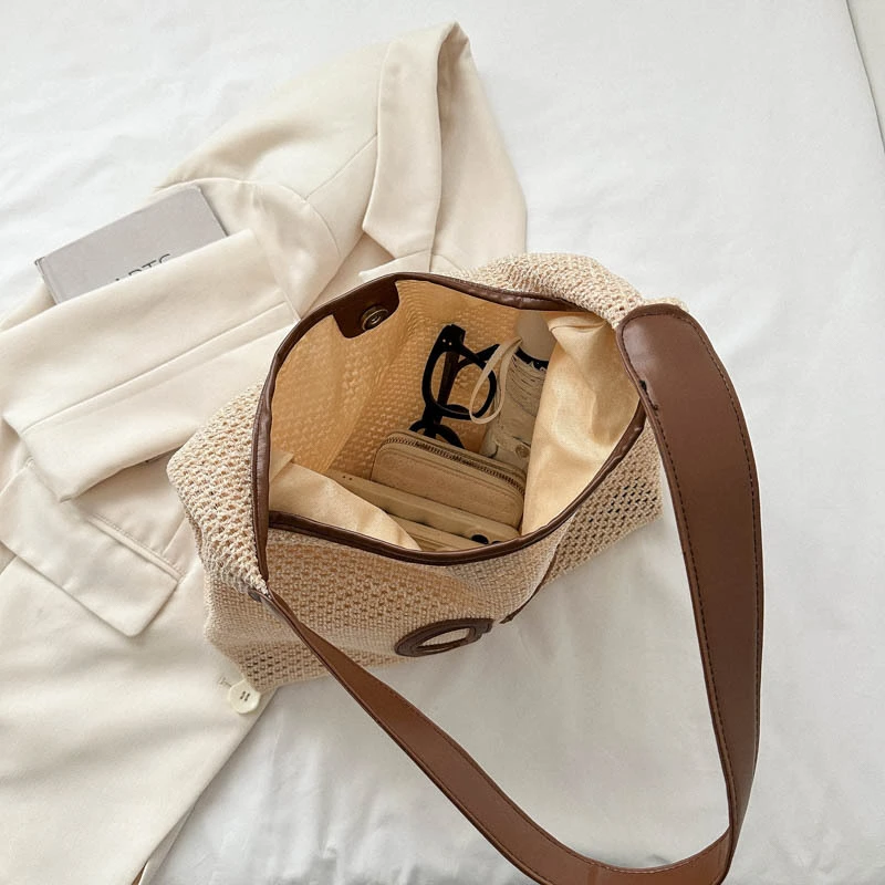 Niche cut-out design bag women's 2024 new fashion straw shoulder bag versatile underarm woven tote bag
