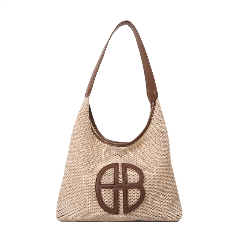 Niche cut-out design bag women's 2024 new fashion straw shoulder bag versatile underarm woven tote bag