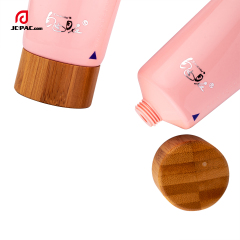 40mm Diameter Eco-friendly 100ml Empty Cosmetics Plastic Tubes for Cleanser with Wooden / Bamboo Cap Packaging