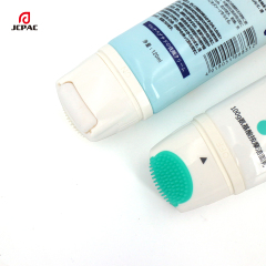 Empty Facial Cleaner Tube With On-Off Silicone And Roller Ball Massage Applicator