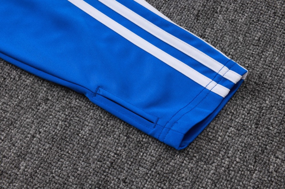 202526 Manchester United Bright Blue Long-sleeved half-pull training kit Football team kit