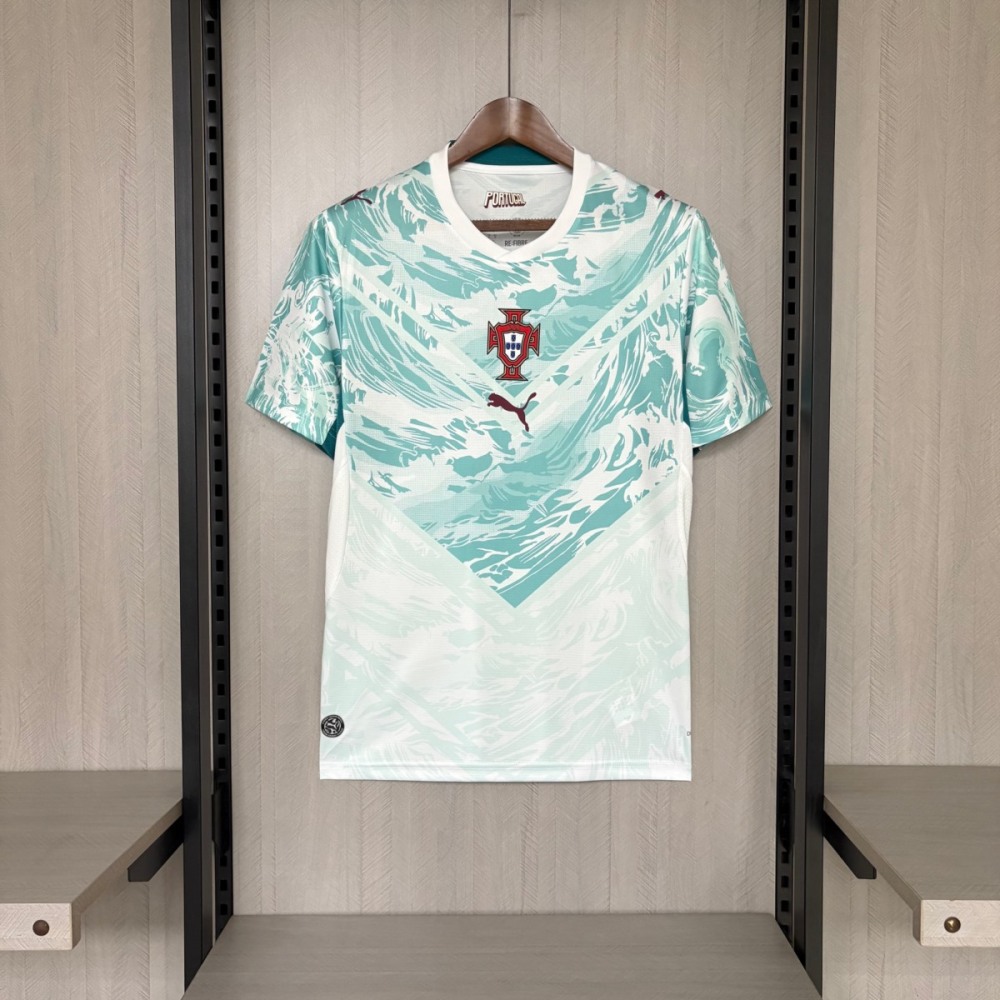 Portugal 2026 World Cup away jersey fan version front view, featuring a white base with teal wave graphic pattern, Portugal national team crest at the center chest and Puma logo below.