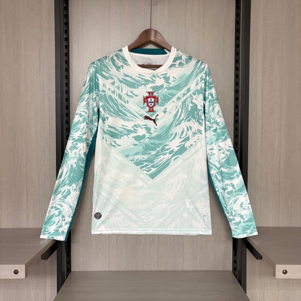 Portugal 2026 World Cup away long sleeve jersey fan version front view with teal ocean‑inspired wave graphics, central Portugal crest and Puma logo on a white base.