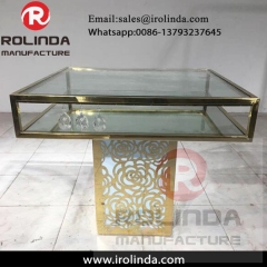 Open concept reception room crystal glass top dining tables with chairs for wedding