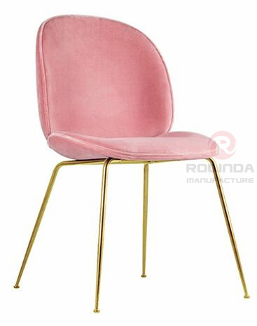 Danish design replicates the golden leg furniture of the Guppy Beetle dining chair