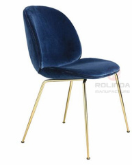 Danish design replicates the golden leg furniture of the Guppy Beetle dining chair