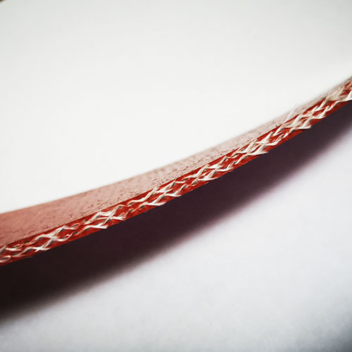 Tejido de fibra de vidrio calandrado con silicona de 5 capas y 3 mm de espesor.