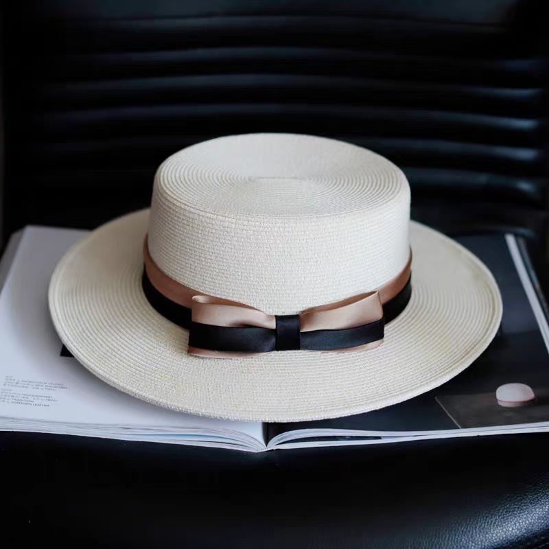 The new retro flat straw hat women's British travel holiday sun hat with large eaves shade and sun protection