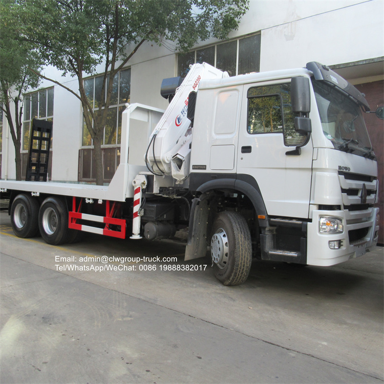 Sinotruk flatbed with knuckle crane 14tons
