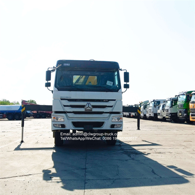 sinotruk dump truck with knuckle crane