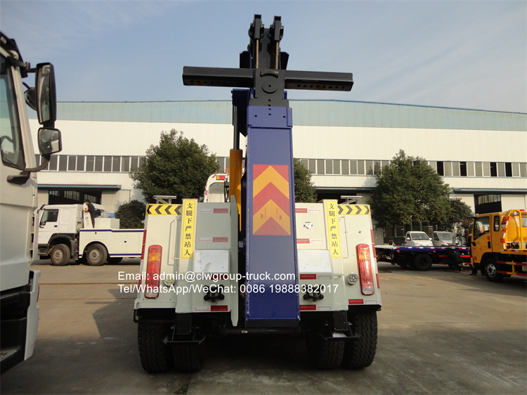 Sinotruk howo 6x4 towing truck 25 ton heavy duty rotator