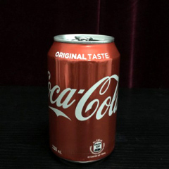 签名硬币进可乐罐(Coin Penetrates The Can)Coca-Cola英文版