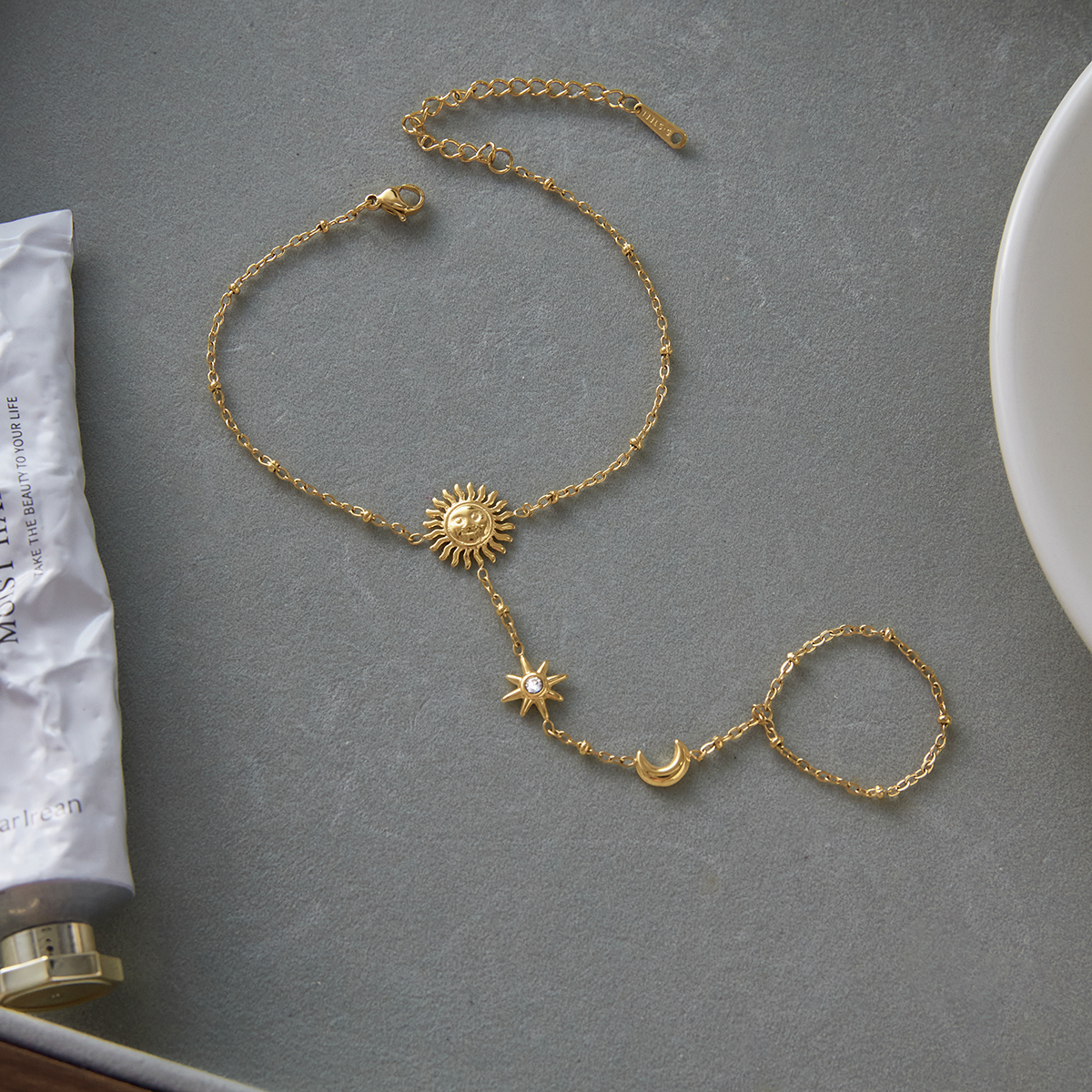 Ladies Classic Style 18K Gold Stainless Steel Bracelet With Sun Moon Star Beads Interlocking Finger Design Diamond Encrusted