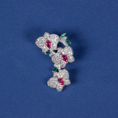 Red Corundum Brooch on White Background