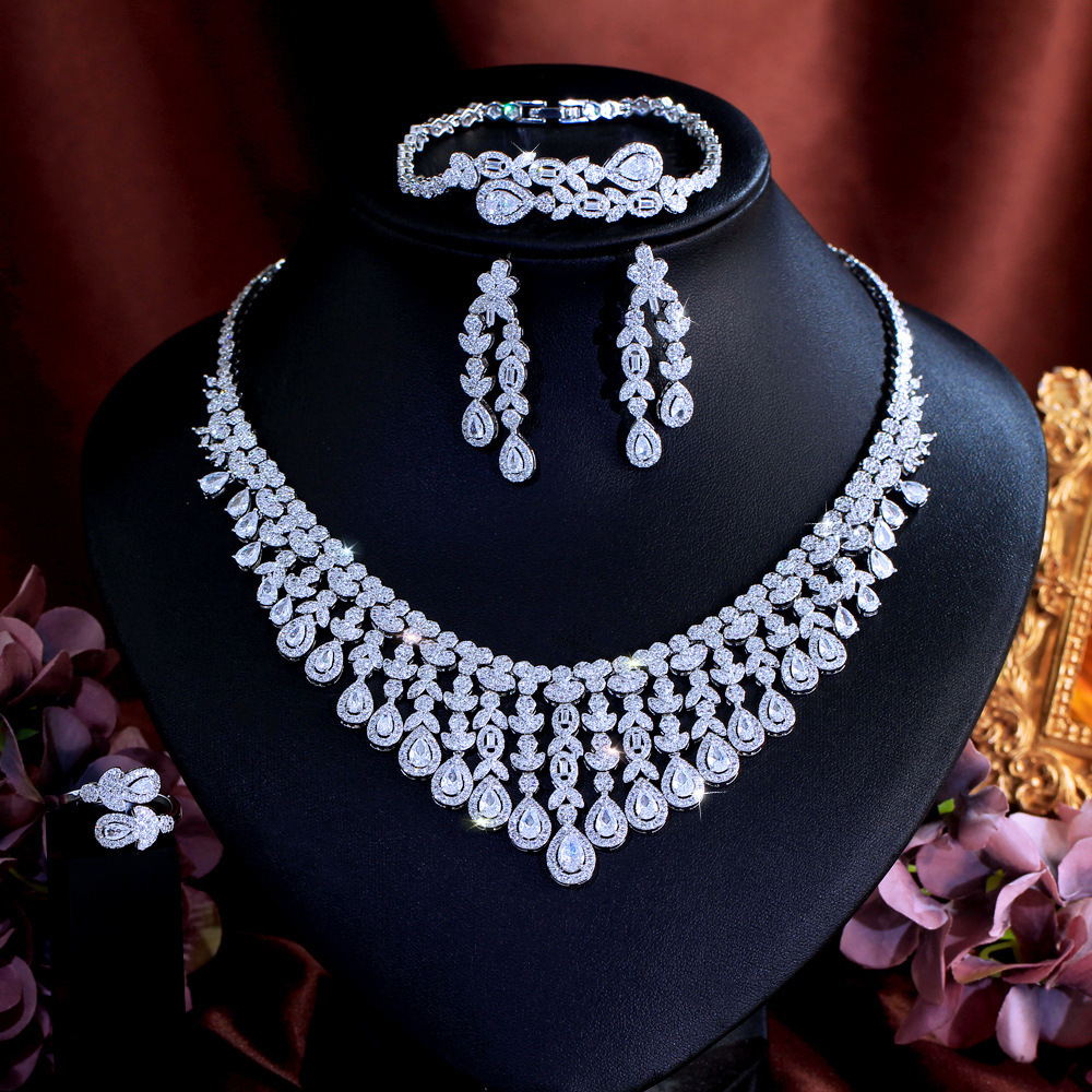 Luxurious Four-Piece Copper Zirconia Jewelry Set For Women Wedding And Banquet Occasions Elegantly Crafted Drop And Heart-Shaped