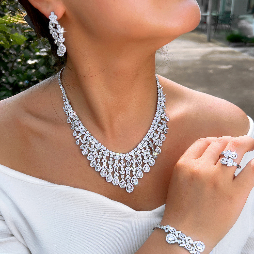 Luxurious Four-Piece Copper Zirconia Jewelry Set For Women Wedding And Banquet Occasions Elegantly Crafted Drop And Heart-Shaped