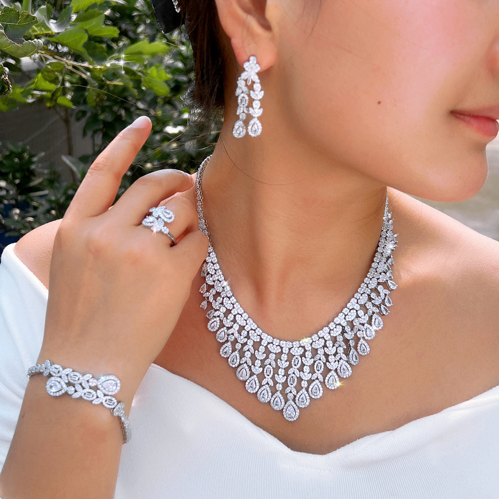 Luxurious Four-Piece Copper Zirconia Jewelry Set For Women Wedding And Banquet Occasions Elegantly Crafted Drop And Heart-Shaped