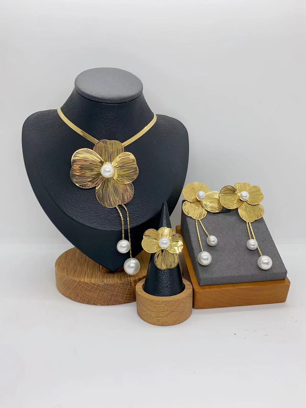 European And American Fashion Trend Ins Style Exaggerated 304 Stainless Steel Hollow Striped Flower Tassel Necklace Earrings Ring Set