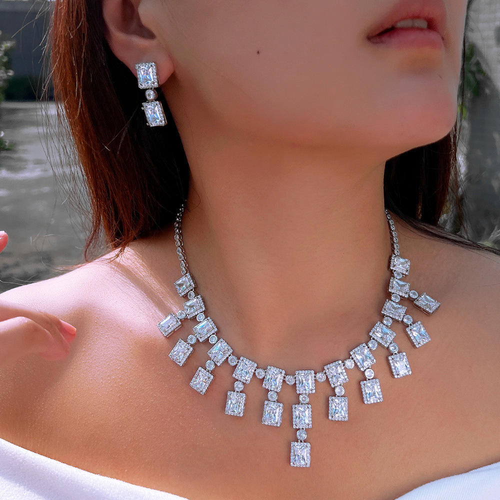 Women's Sparkling Geometric Two-Piece Jewelry Set - Diamond-Like Crystal Rhinestones Copper Bridal Party Dinner Earrings & Necklace