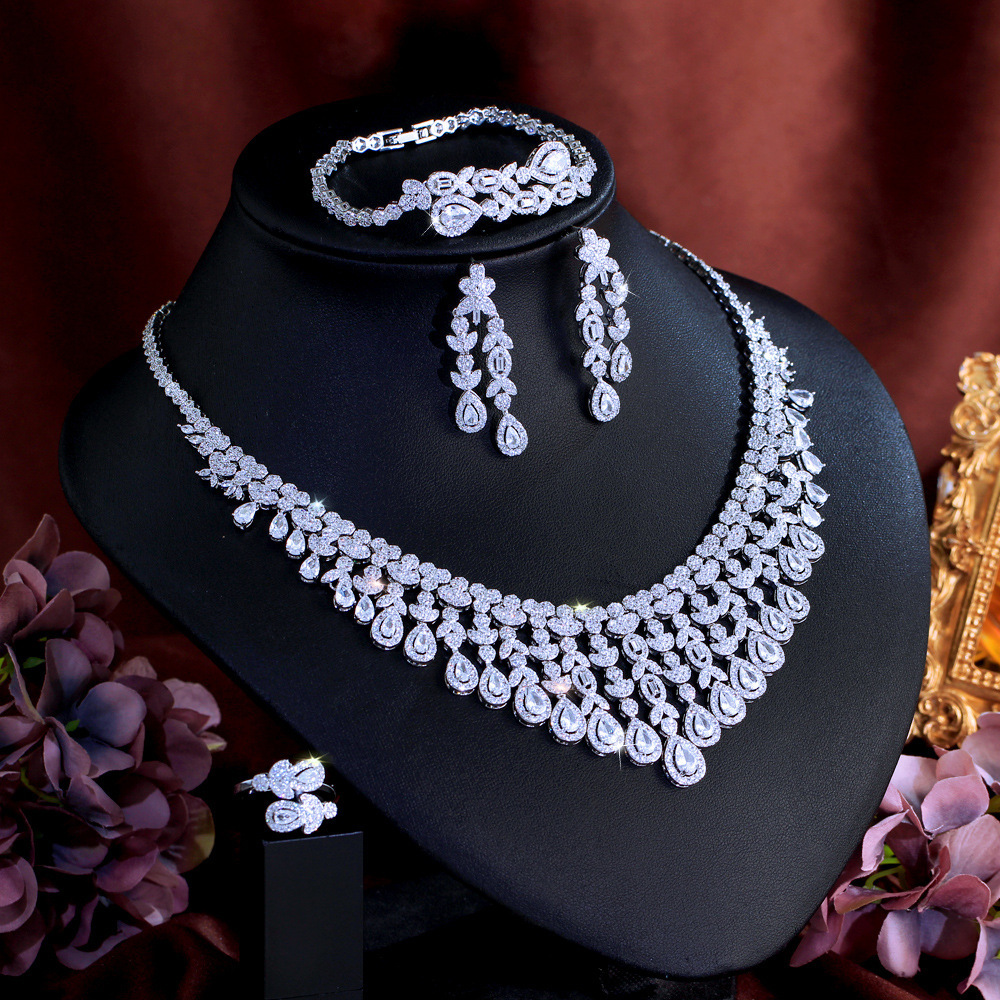 Luxurious Four-Piece Copper Zirconia Jewelry Set For Women Wedding And Banquet Occasions Elegantly Crafted Drop And Heart-Shaped