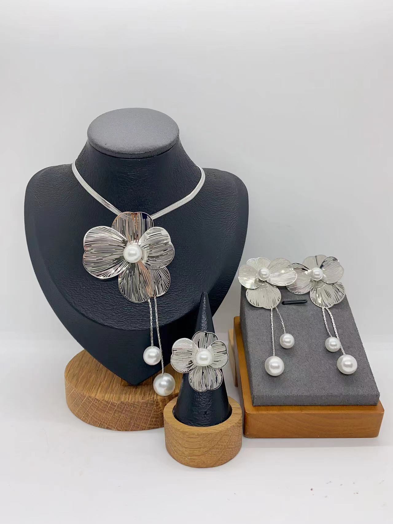 European And American Fashion Trend Ins Style Exaggerated 304 Stainless Steel Hollow Striped Flower Tassel Necklace Earrings Ring Set
