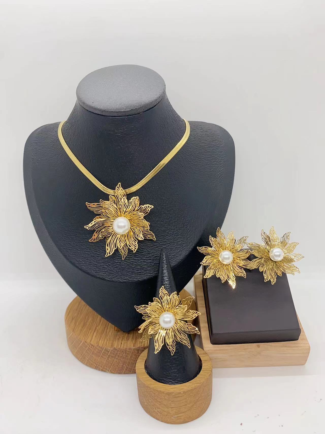 European And American Fashion Trend Ins Style Exaggerated 304 Stainless Steel Hollow Multi-Petal Flower Necklace Earrings Ring Set
