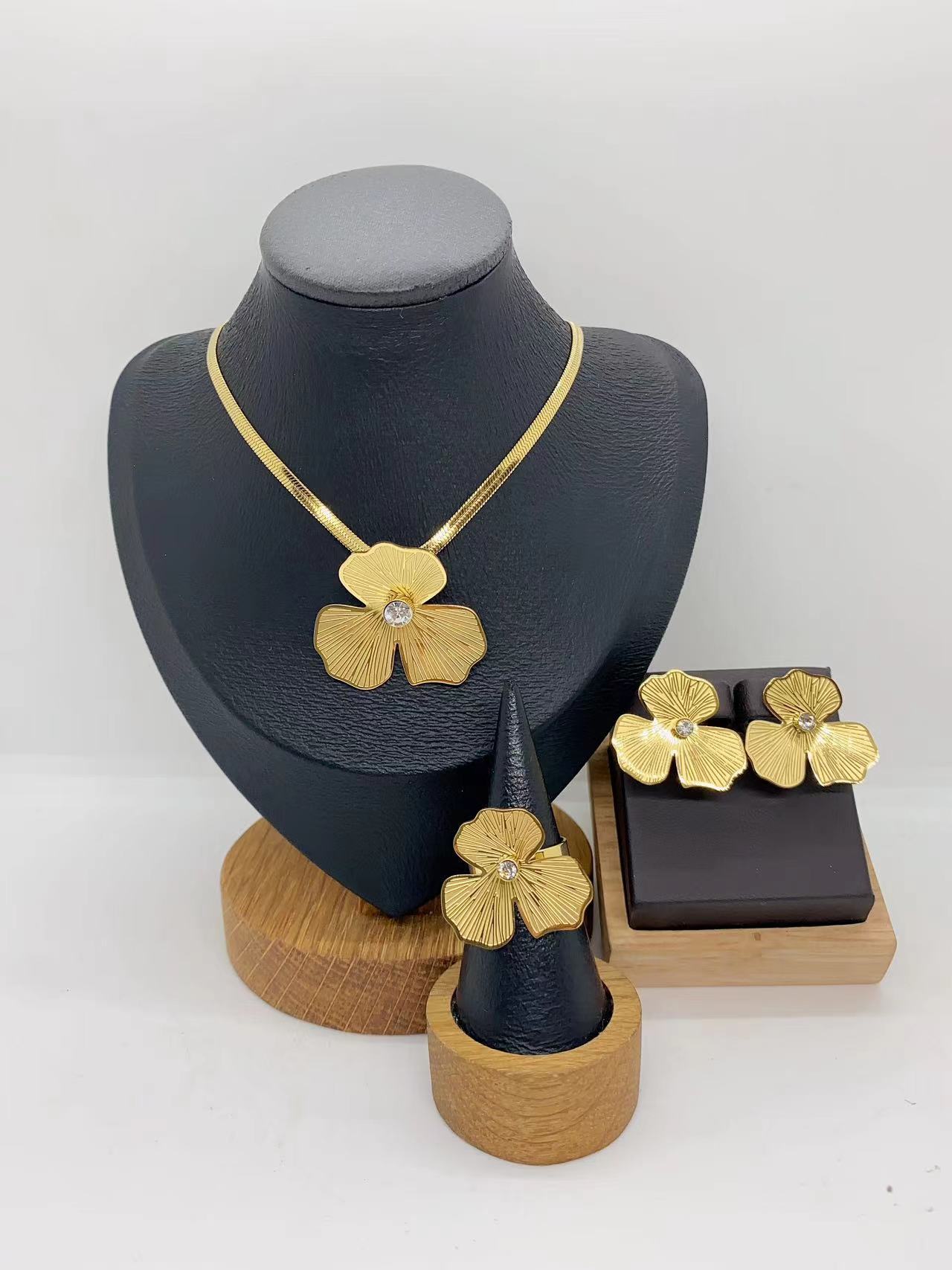 European And American Fashion Trend Ins Style Exaggerated 304 Stainless Steel Hollow Embossed Half Round Flower Necklace Earrings Ring Set