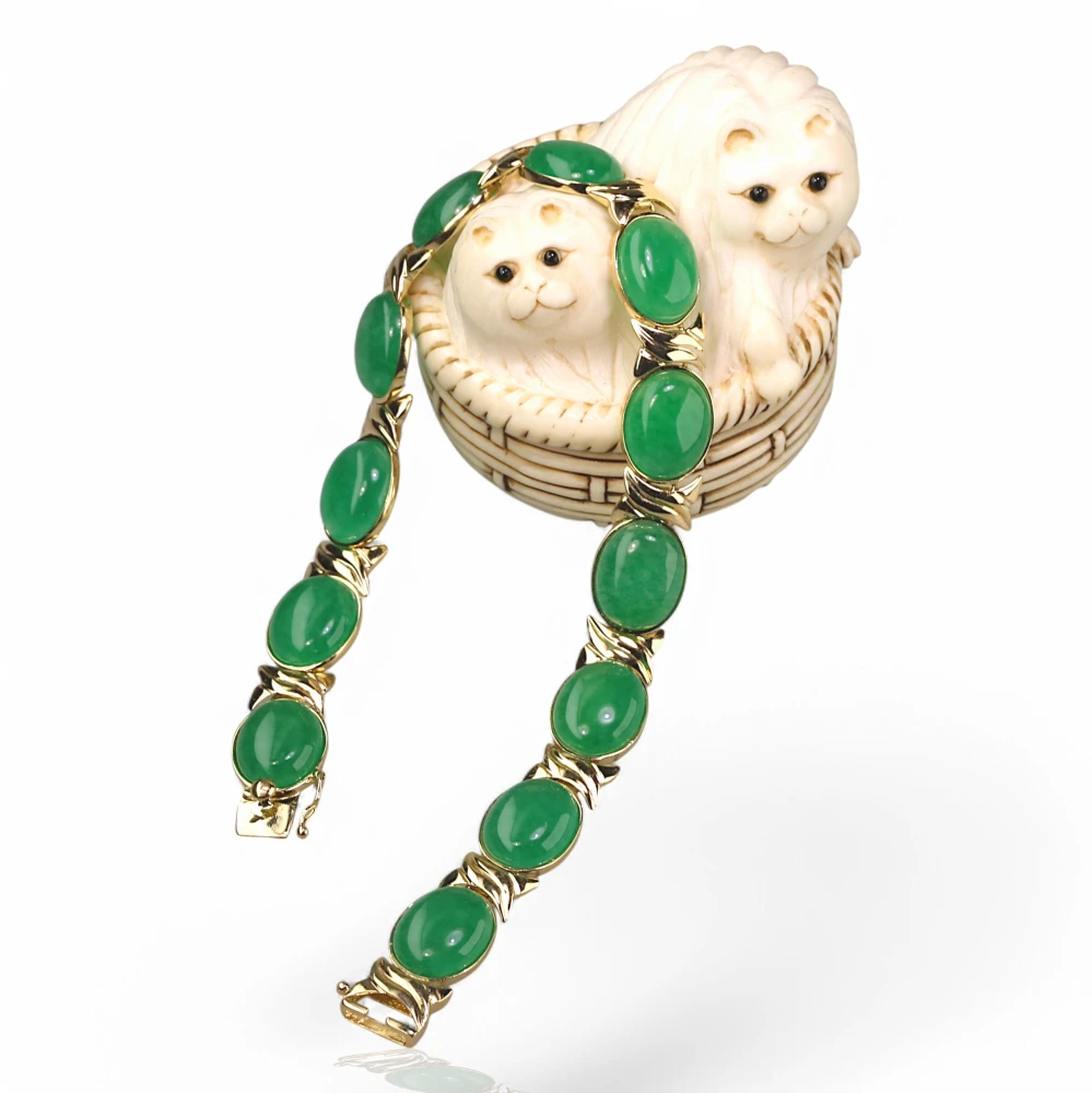 Imperial green jade bracelet with 14K gold setting