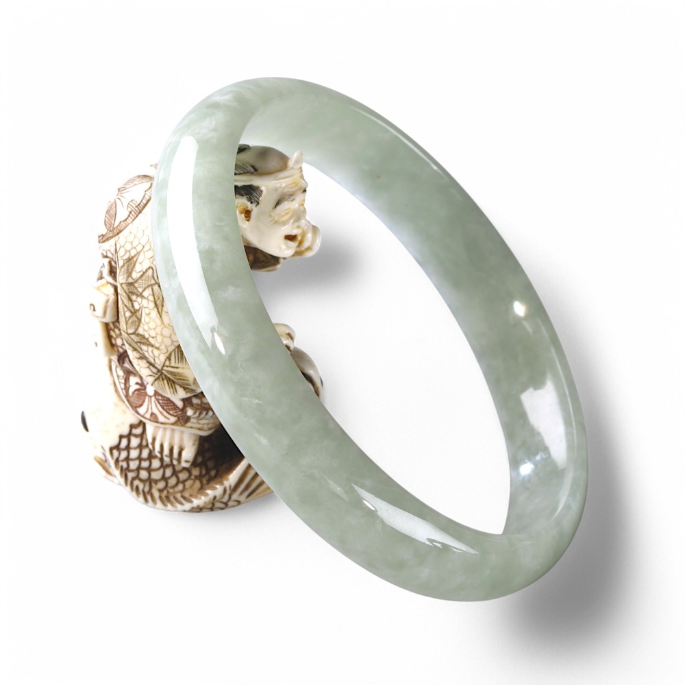 Solid Green Jade Bangle $100 - $200