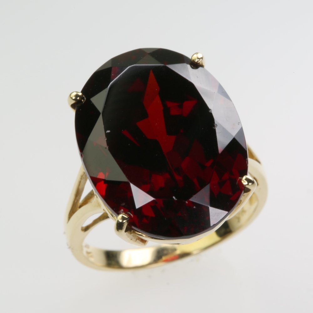Solid 14 karat Gold Garnet Ring