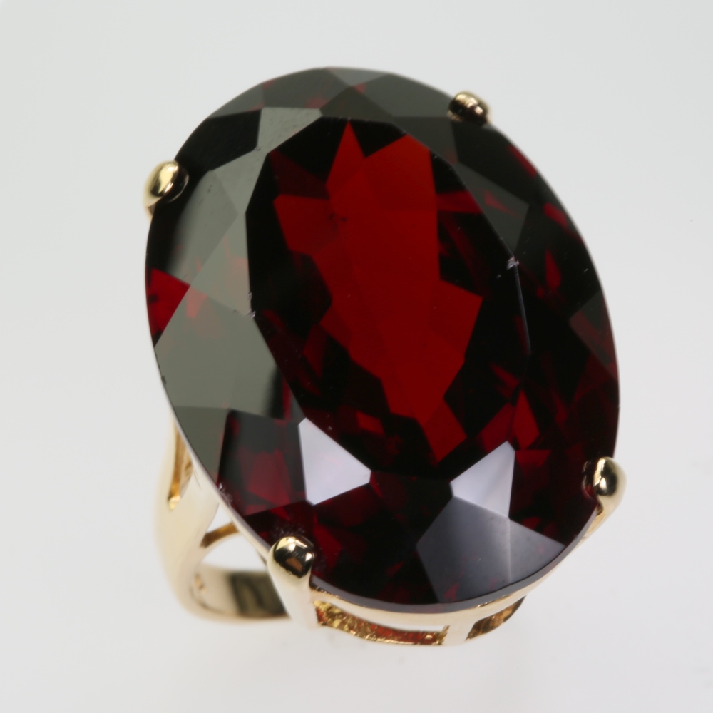 Solid 14 karat Gold Garnet Ring