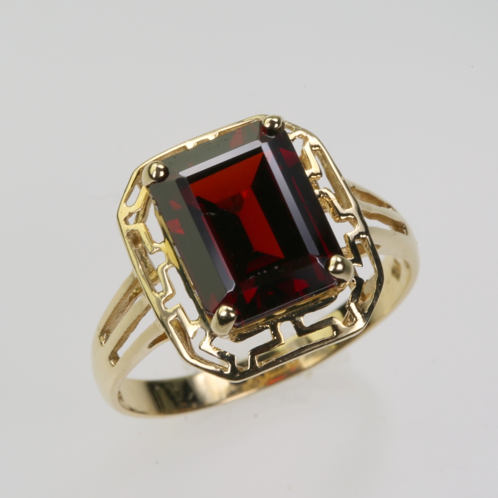Solid 14 karat Gold Garnet Ring