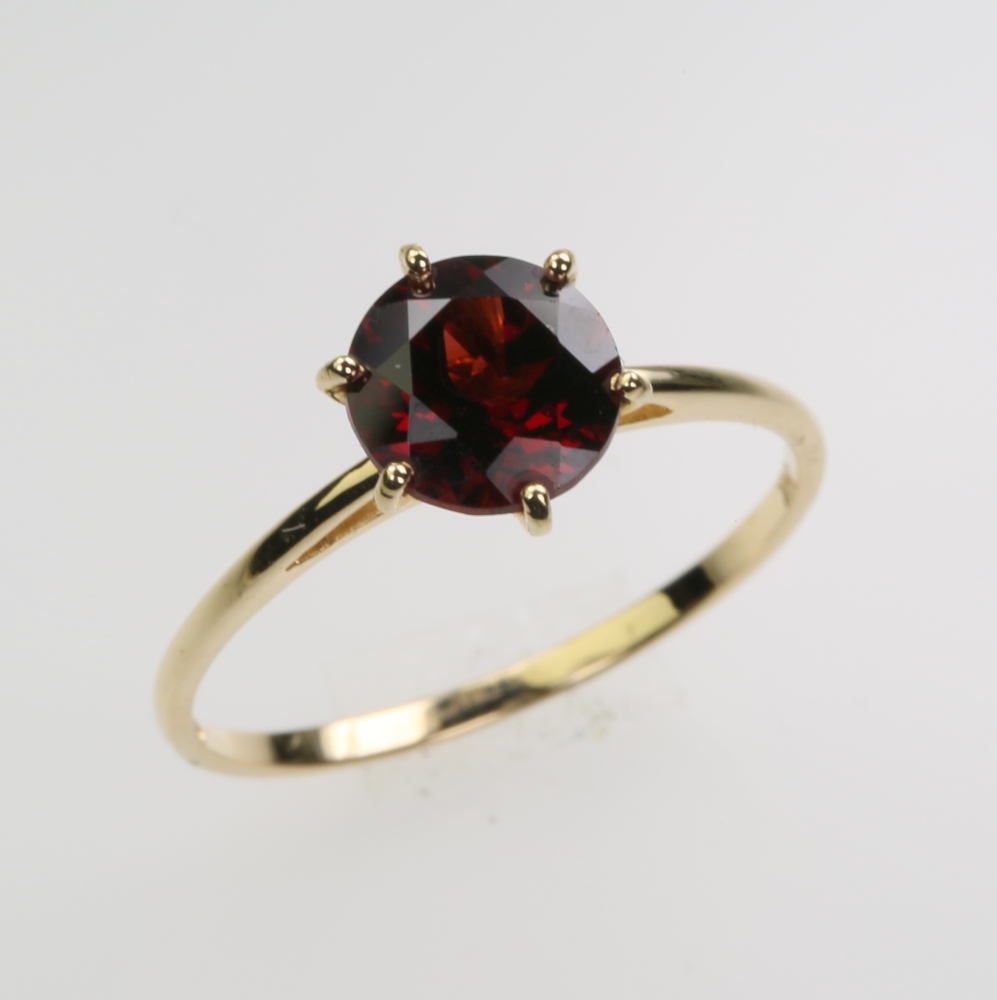 Solid 14 karat Gold Garnet Ring