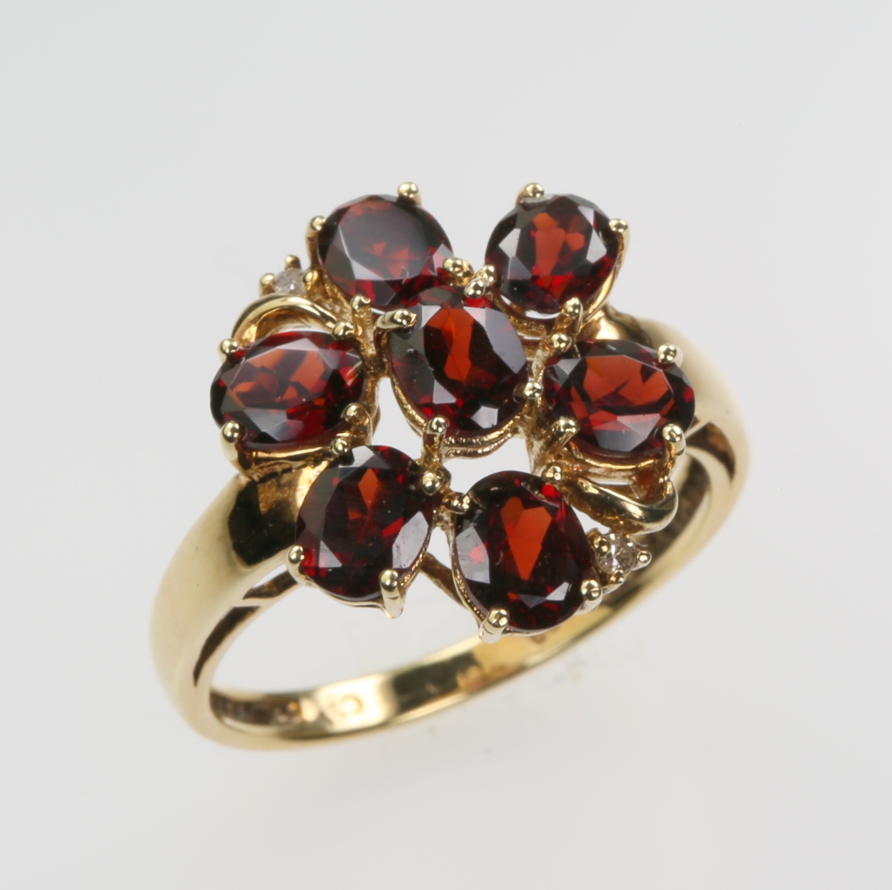 Solid 14 karat Gold Garnet Ring