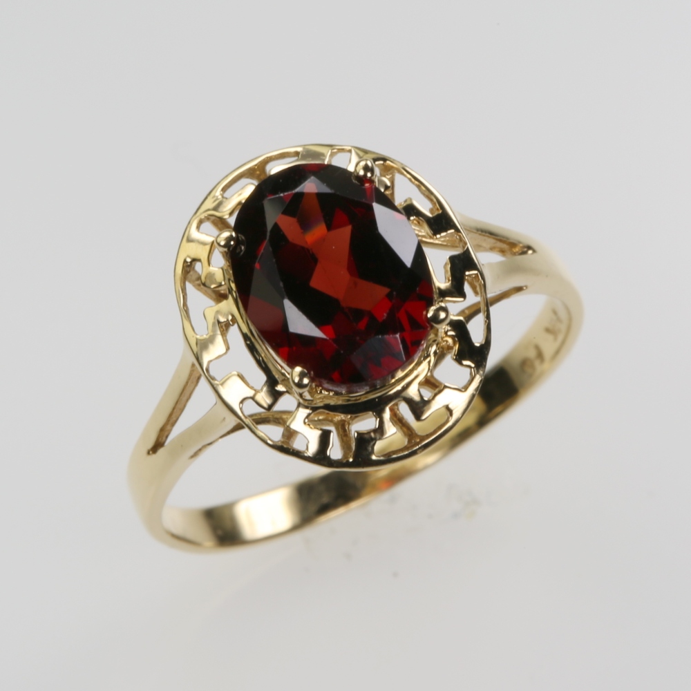 Solid 14 karat Gold Garnet Ring