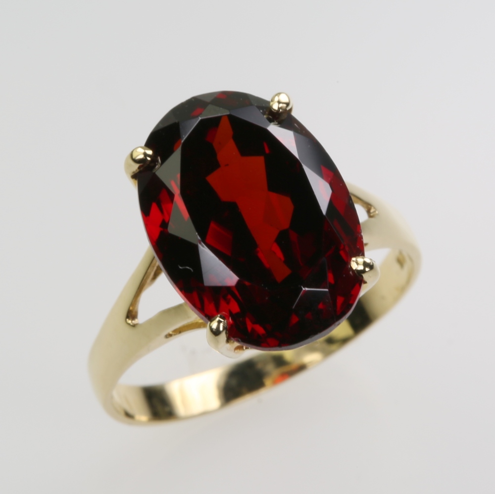 Solid 14 karat Gold Garnet Ring