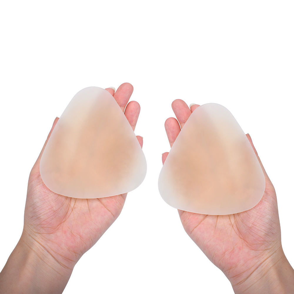 Reusable silicone nipple pasties, triangular adhesive, invisible coverage design, suitable for women's collarless tops.
